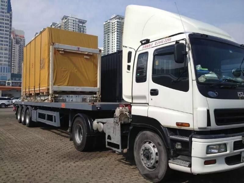 中港平板车运输与港口货物装卸搬运 高效联动保障跨境物流畅通